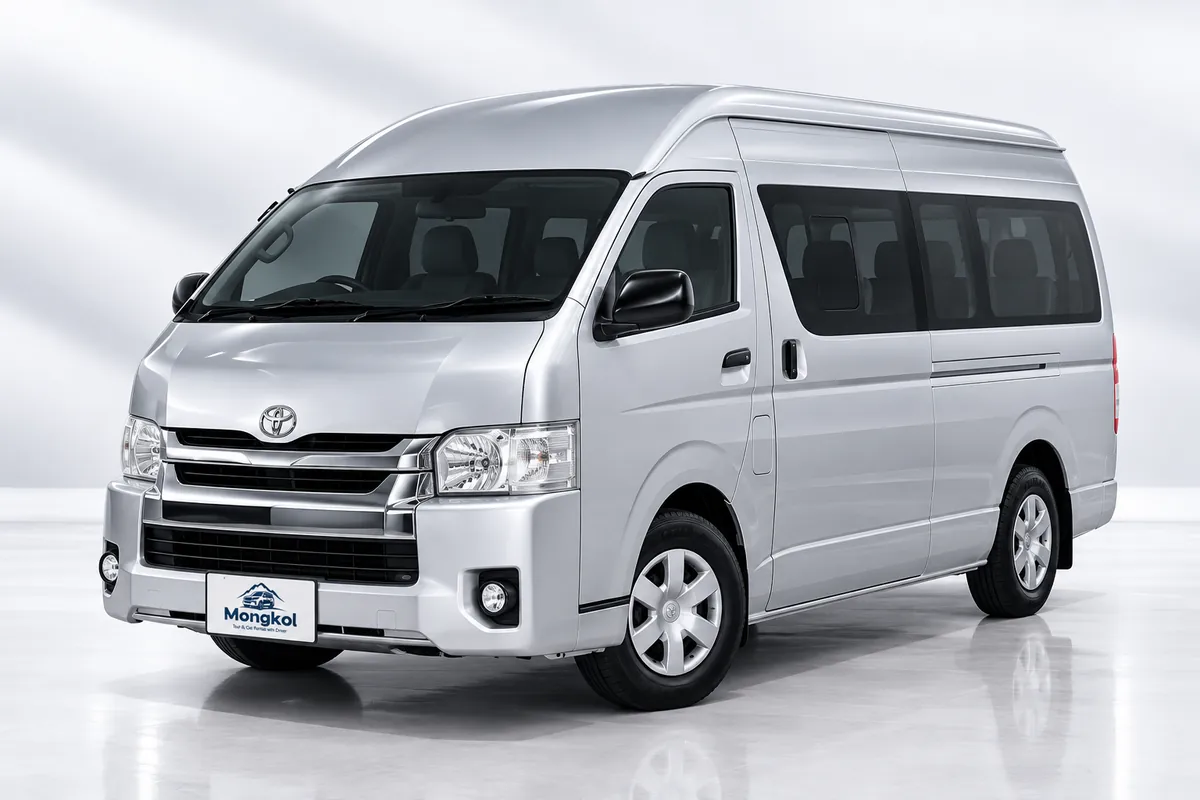 รถ Toyota Hiace สีเงิน รถตู้หลังคาสูง พร้อมคนขับ