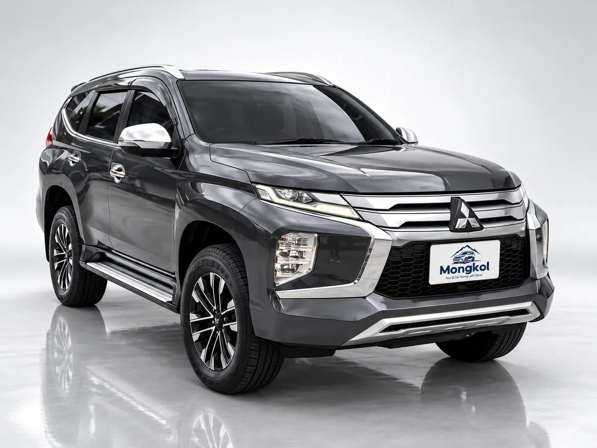 รถ Mitsubishi Pajero Sport สีเทา SUV 7 ที่นั่ง พร้อมคนขับ